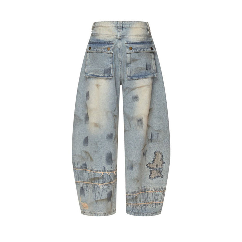 Men's Distressed Wide-Leg Jeans with Chaotic Embroidery & Metal Eyelet Detail