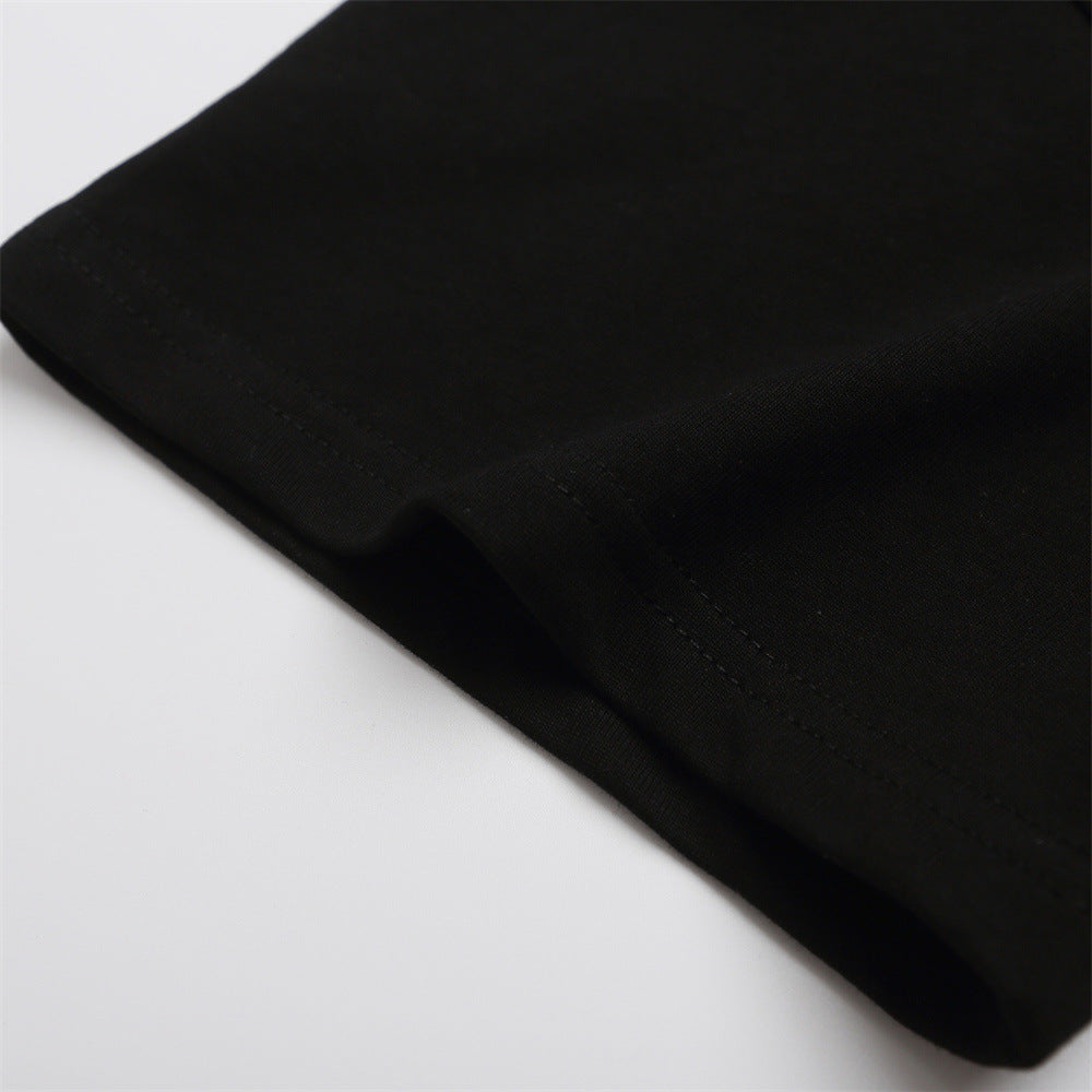 Black T-shirt sleeve hem close-up