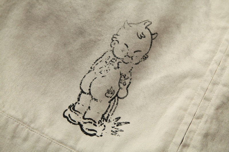 Veste zippée à imprimé graphique – Coton délavé effet usé, col violet et badge