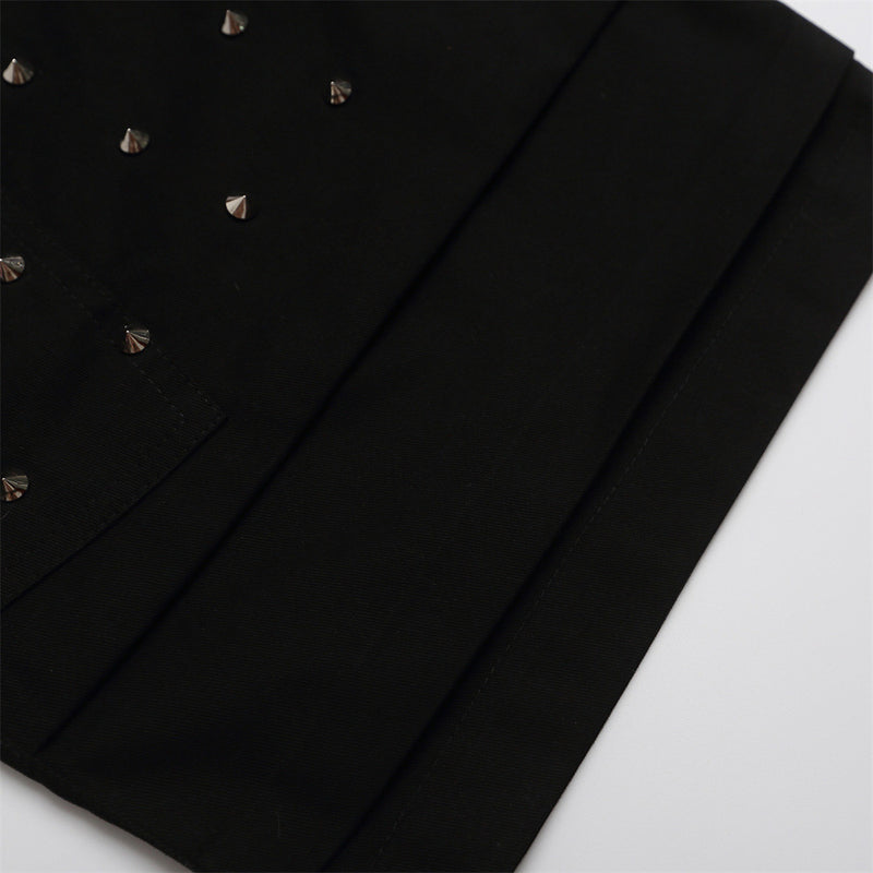 Close-up of black shorts hem with layered cuff detail