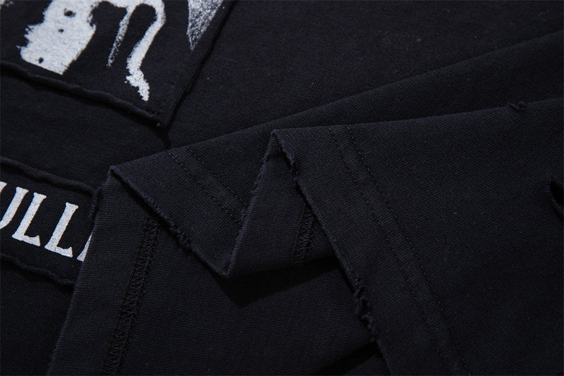 Longsleeve mit dunklen Grafik-Patches – Verwaschenes Oversized-Shirt aus Baumwolle