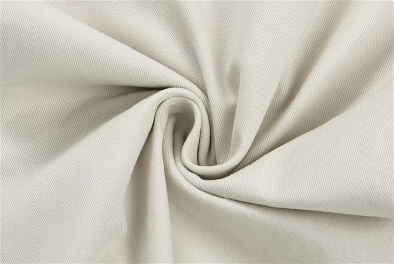 Close-up of cream twill fabric texture