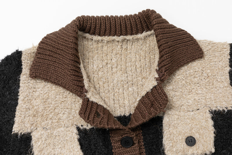Color-block plush patchwork knitted cardigan in cream, charcoal, and brown with chartreuse ribbed cuffs, front view