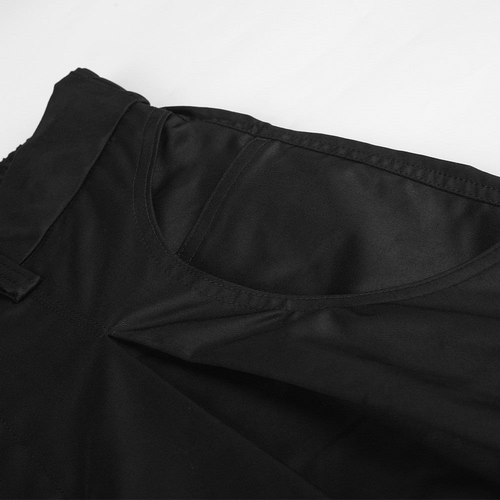 Wide-Leg Pleated Trousers – Oversized Silhouette with Curved Hem