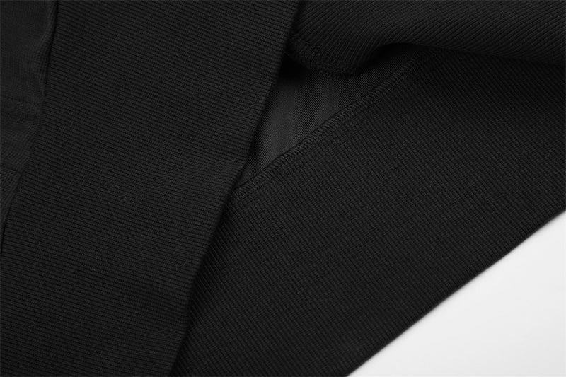 Close-up of black textured fabric on the hoodie jacket sleeve
