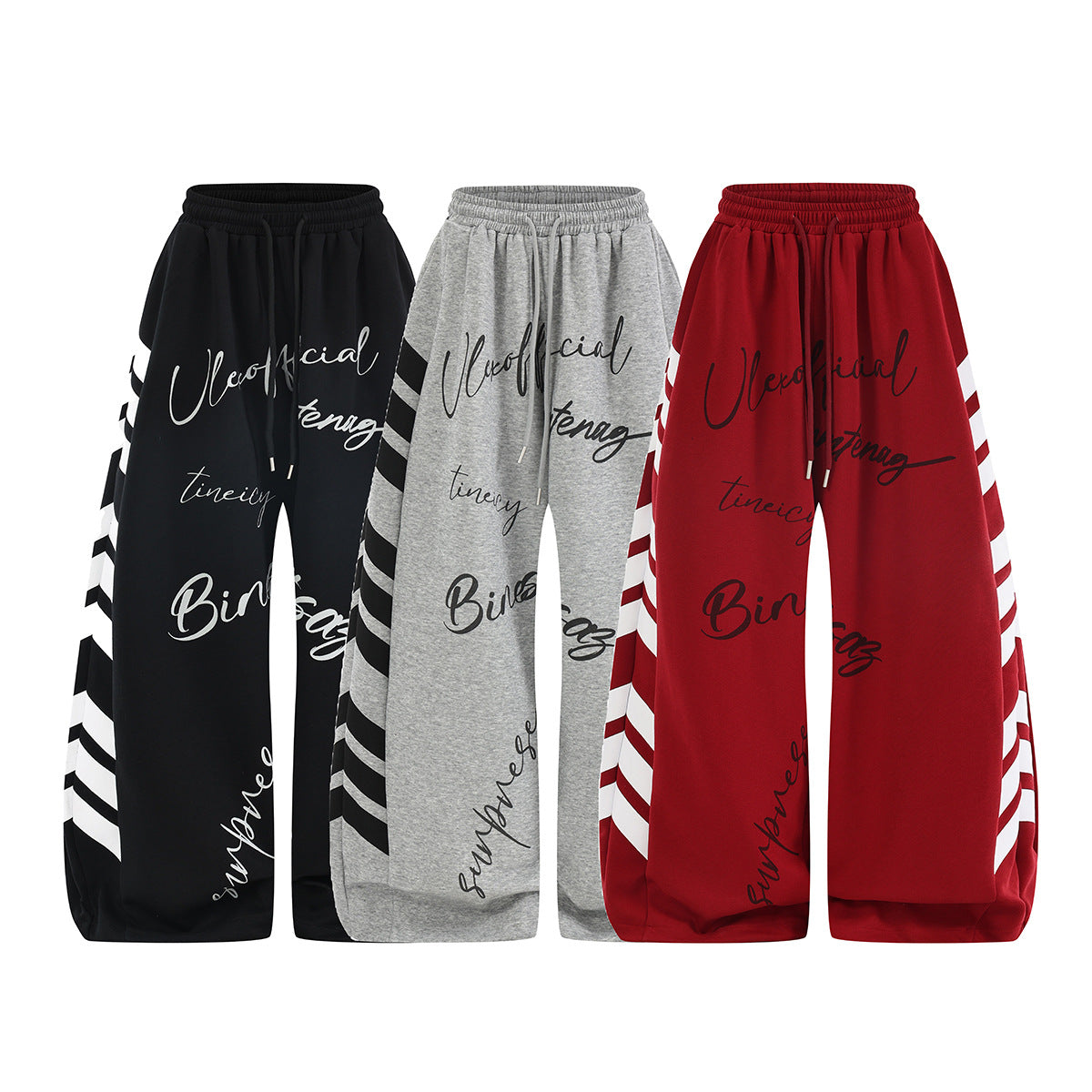 Pantalon de survêtement à jambes larges, rayures diagonales et lettrage – Coupe droite street