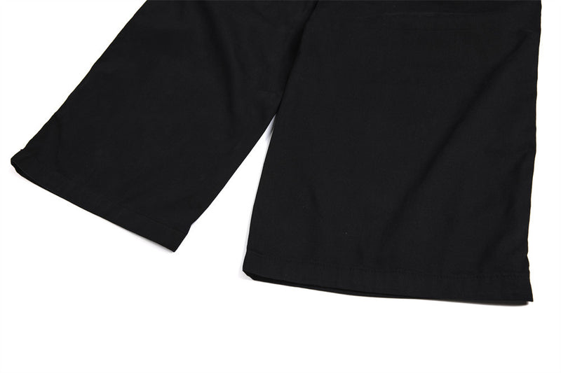 Pantalon cargo homme noir wide leg avec taille effet double boutonnage et multiples poches