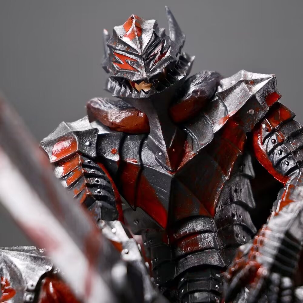 The Berserk Guts Bloodstained Warrior Statue is a 1/7 scale PVC figure featuring a warrior in spiked armor with dark metallic and red accents. Its helmet&