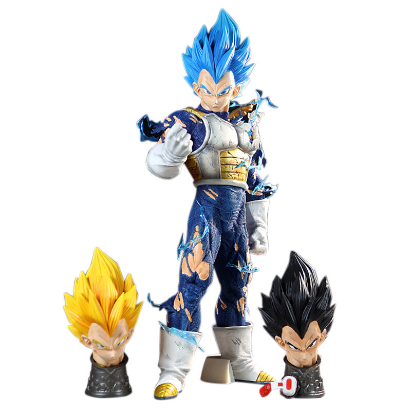 The Seakoff Vegeta Collectible Figure – Dragon Ball Z (45cm) features blue hair and a torn outfit, emphasizing a battle-ready stance. It includes four interchangeable heads, capturing Super Saiyan forms and the Dragon Ball Z essence.