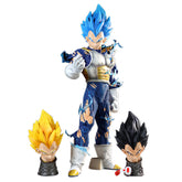 The Seakoff Vegeta Collectible Figure – Dragon Ball Z (45cm) features blue hair and a torn outfit, emphasizing a battle-ready stance. It includes four interchangeable heads, capturing Super Saiyan forms and the Dragon Ball Z essence.