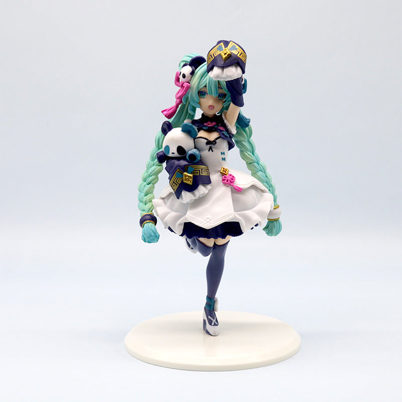 The Hatsune Miku Panda-themed 18cm PVC Figure, a charming collectible by Hatsune Miku, features long turquoise braided hair and is dressed in white and blue, holding a panda plush toy aloft. It gracefully stands on a round base against a plain background, capturing its enchanting anime charm.