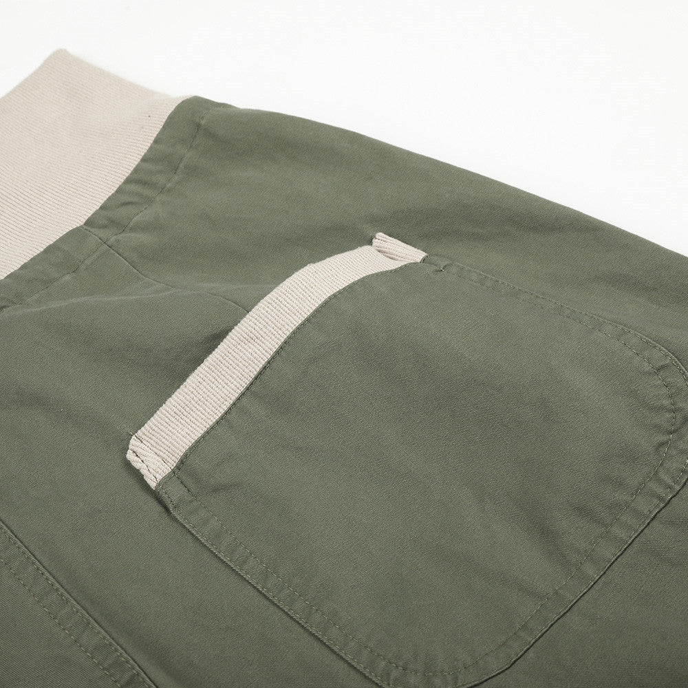 Pantalon palazzo à jambes larges – Taille haute, braguette à boutons, ceinture côtelée et ourlet brut