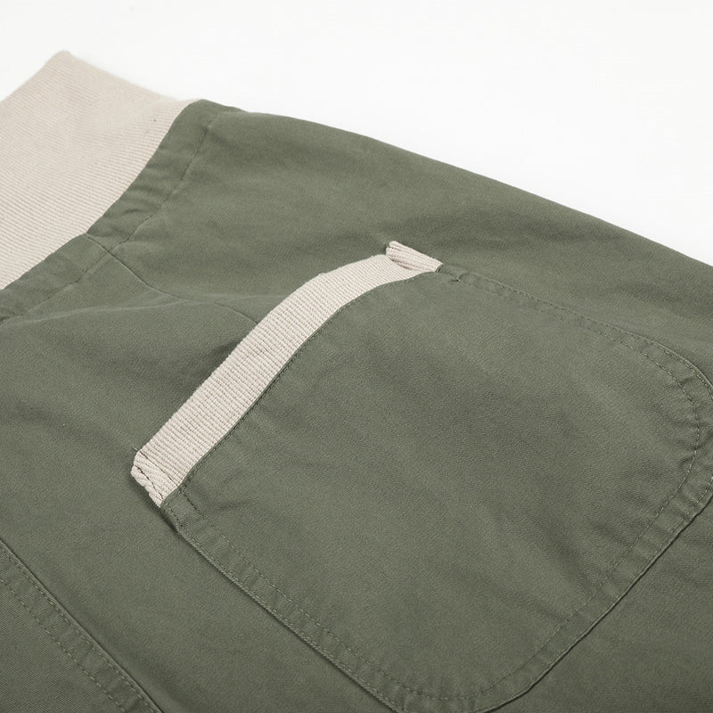Pantalon palazzo à jambes larges – Taille haute, braguette à boutons, ceinture côtelée et ourlet brut