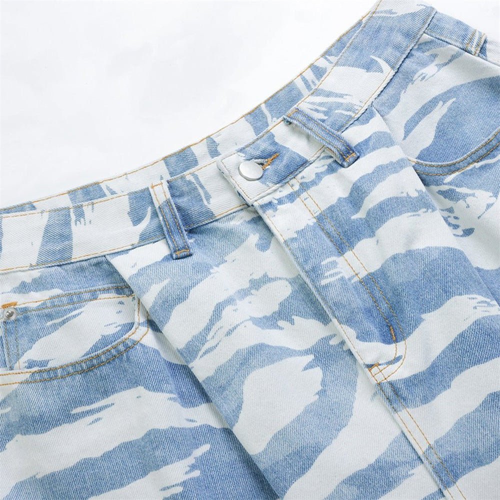 Close-up of waistband and front fly on light blue zebra camo denim