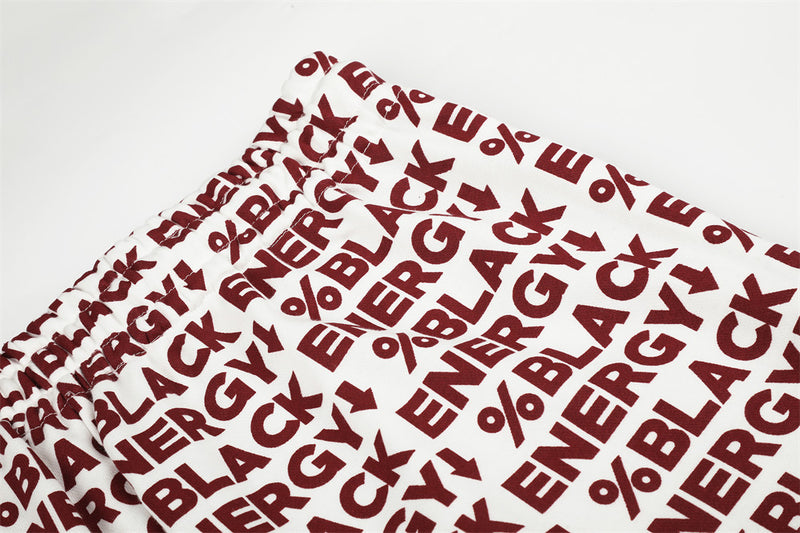 Close-up of white elastic waistband and red BLACK ENERGY print