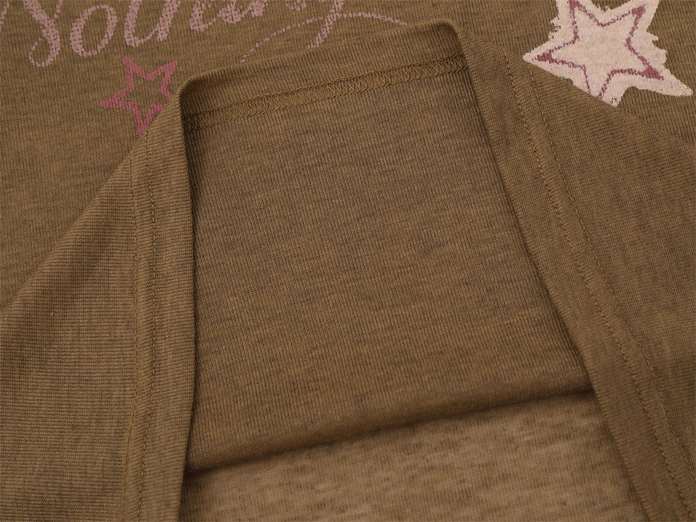 T-shirt homme raglan à manches longues avec manches imprimées d'étoiles et motif graphique sur le devant