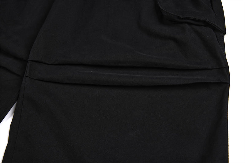 Pantalon cargo homme noir wide leg avec taille effet double boutonnage et multiples poches