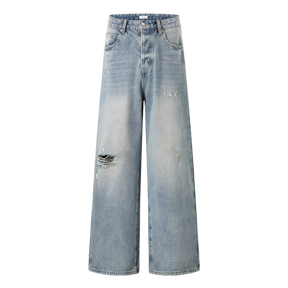 Men's wide-leg distressed light blue washed denim jeans with knee rip and vintage fade, front and back view