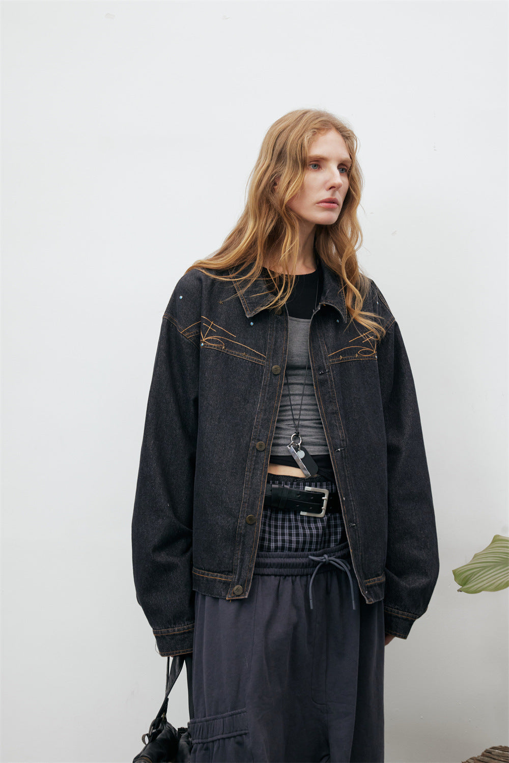 Black Denim Jacket with Embroidered Stitch Detail and Studded Accents