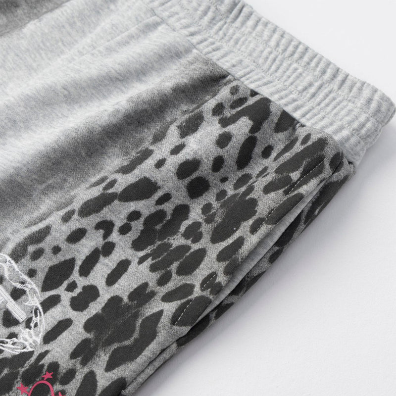 Pantalones de chándal punk de pierna ancha con estampado de leopardo degradado – Corte relajado para hombre