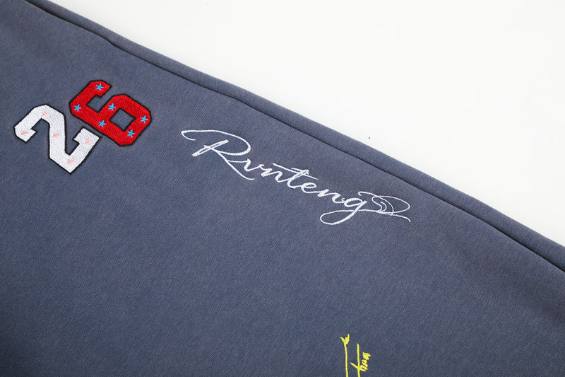 Pantalon de survêtement à jambes larges avec broderies graffiti signature et numéro 26