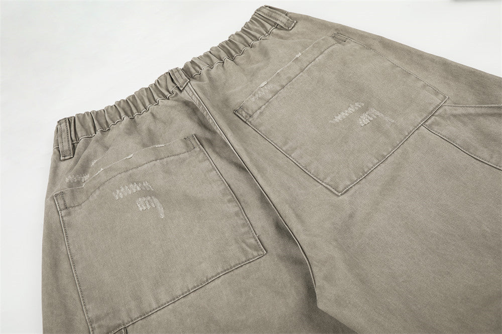 Pantalon cargo wide leg – Kaki délavé, éclaboussures de peinture et chaîne métallique