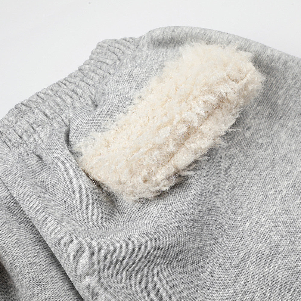 Sweatpants mit weitem Bein, Sternstickerei und umgeschlagenem Sherpa-Bund