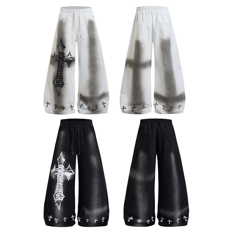Pantalon de survêtement à jambes larges avec croix gothique et finition délavée