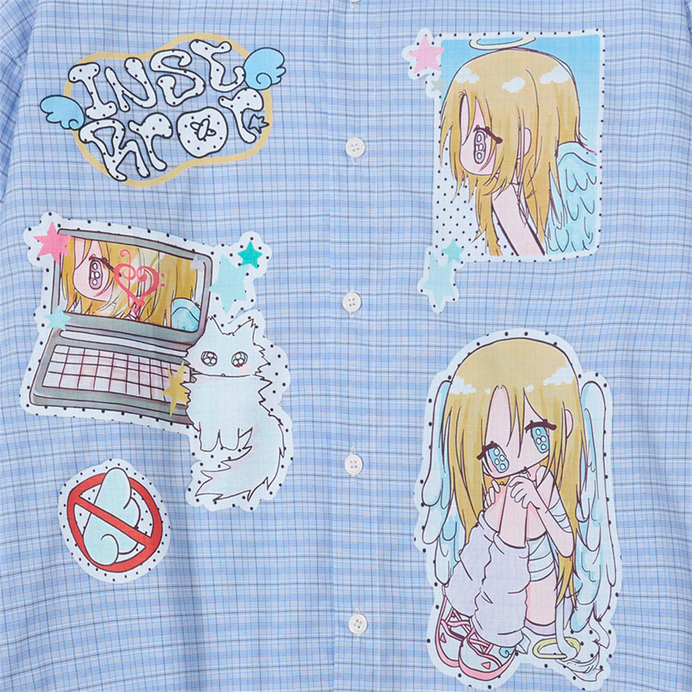 Blue plaid shirt front close-up with anime patches and graphic details