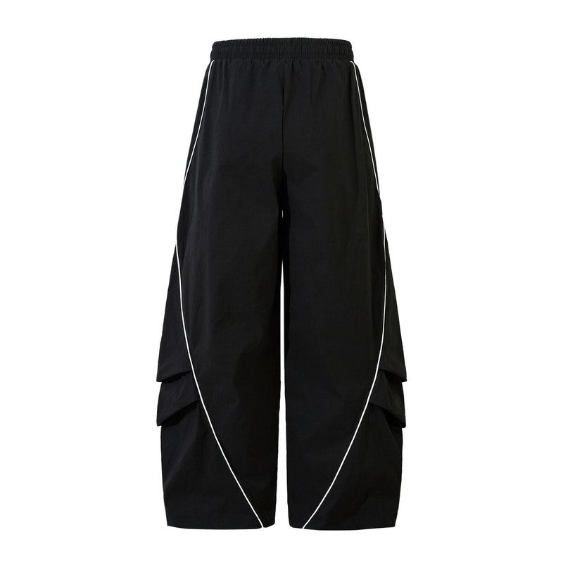 Herren-Trackpants mit kontrastierender Paspel und Colorblock-Seiteneinsätzen