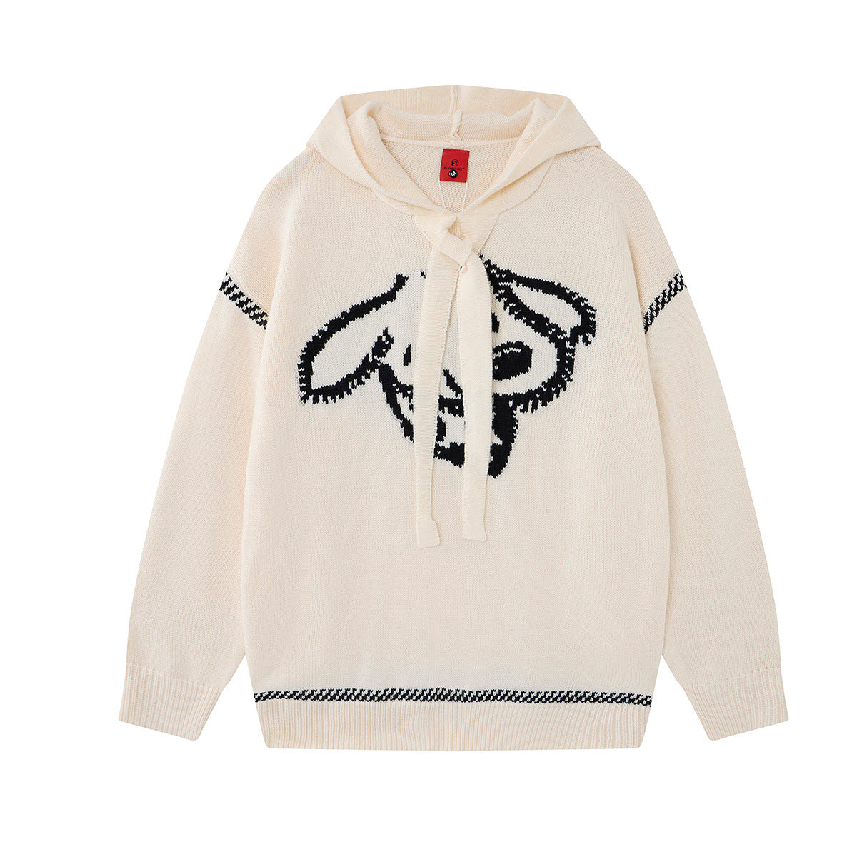 Pull à capuche oversize en maille jacquard crème, motif graphique noir marqué et bordures rayées pied-de-poule