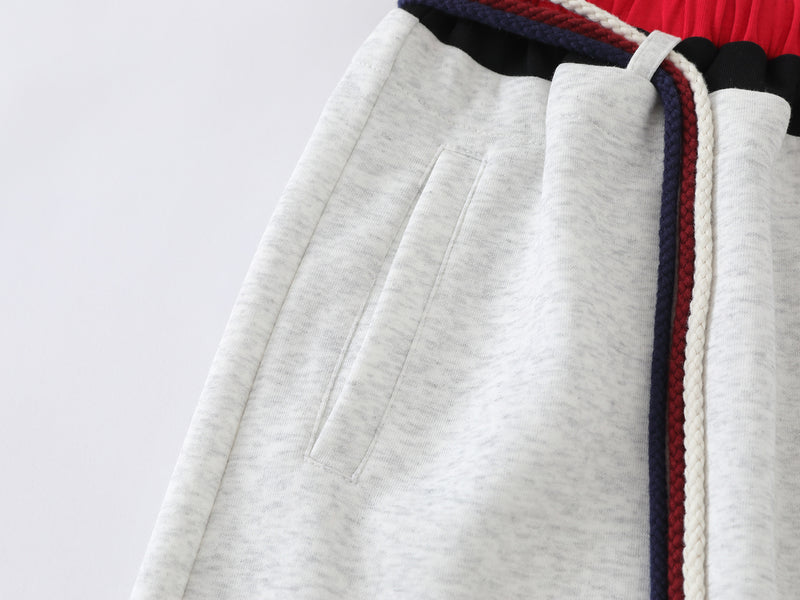 Pantalon de survêtement à jambes larges avec double ceinture et cordon tressé