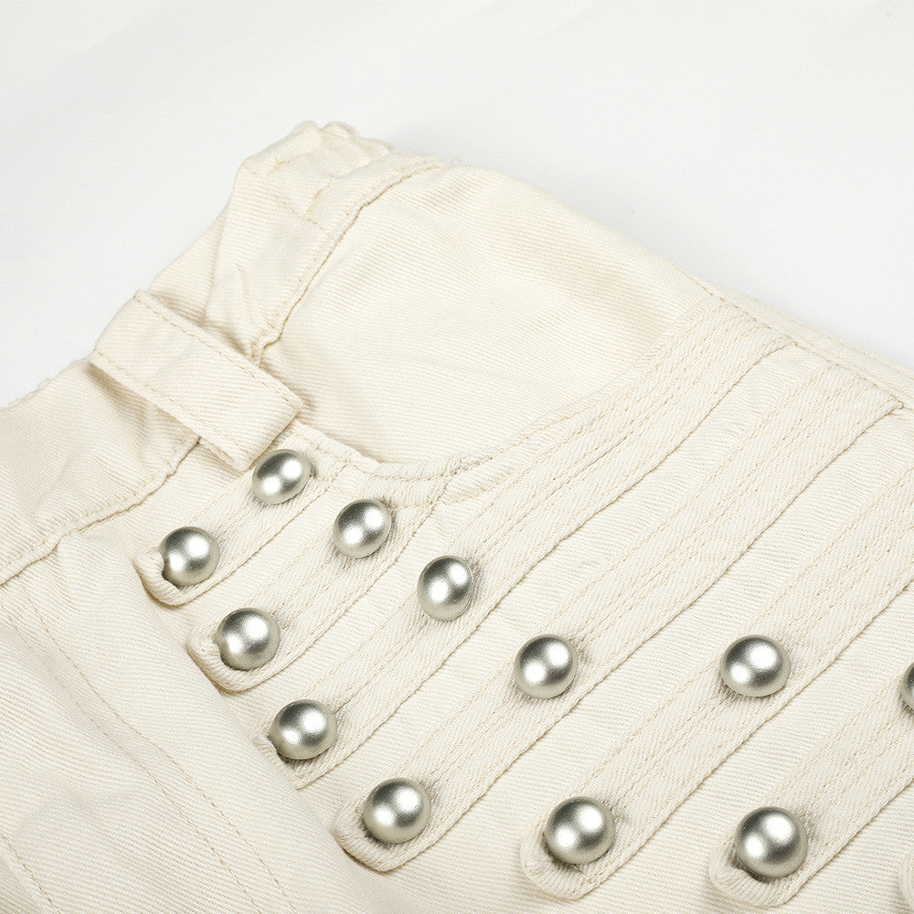 Pantalon homme coupe large orné de perles et de clous métalliques