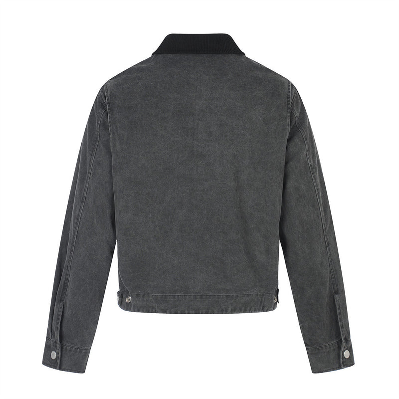 Back view of black distressed jean jacket with plain panel and brown collar