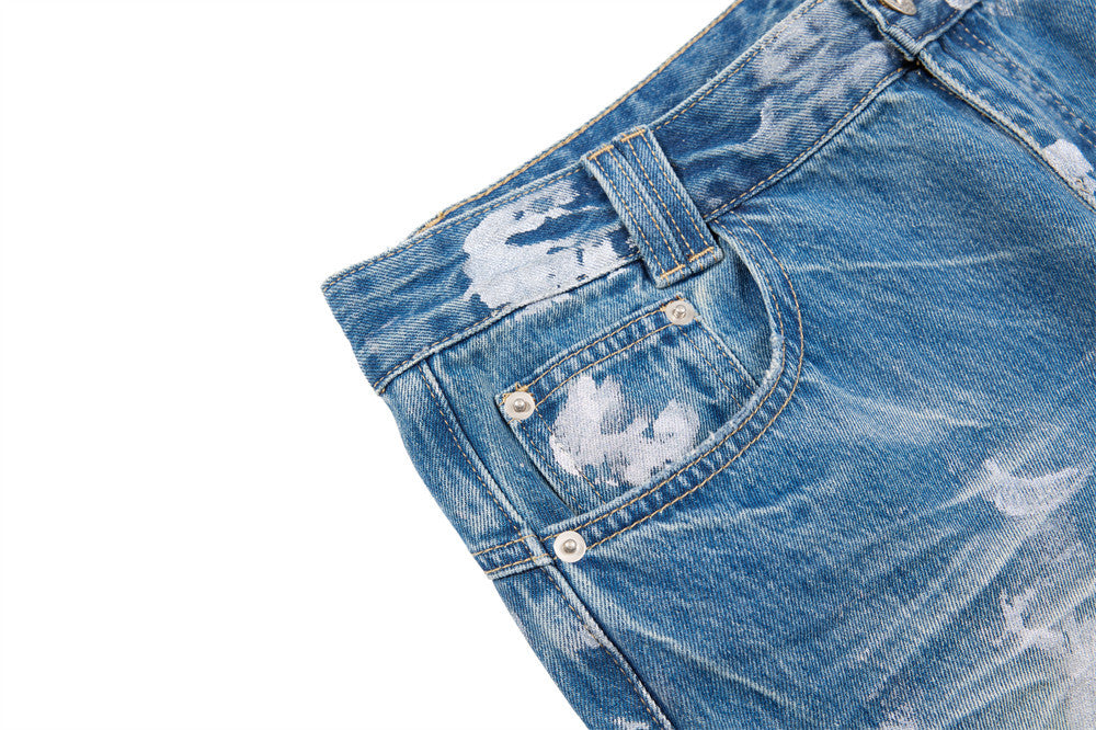 Distressed Flare Jeans – Men's Washed Blue Wide-Leg Denim with Paint Splatter