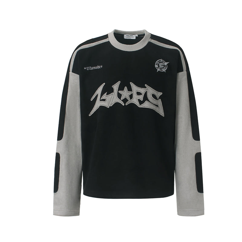 Langarmshirt aus velourslederartigem Material im Colorblock-Design mit Graffiti-Patch-Logo