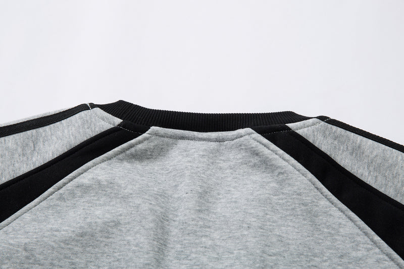 Sweat-shirt motif chat en smoking avec imprimé note de musique et manches raglan color block