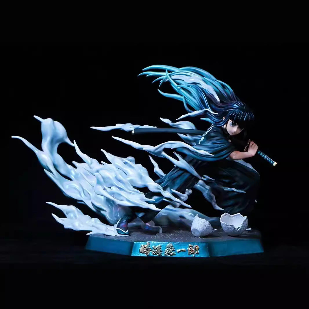 The Muichiro Tokito Demon Slayer figure, an 18cm premium PVC collectible by Demon Slayer, features the Mist Hashira with dynamic mist effects. It depicts him wielding a sword with long blue hair and a swirling blue and white energy on a round base with Japanese lettering on black.