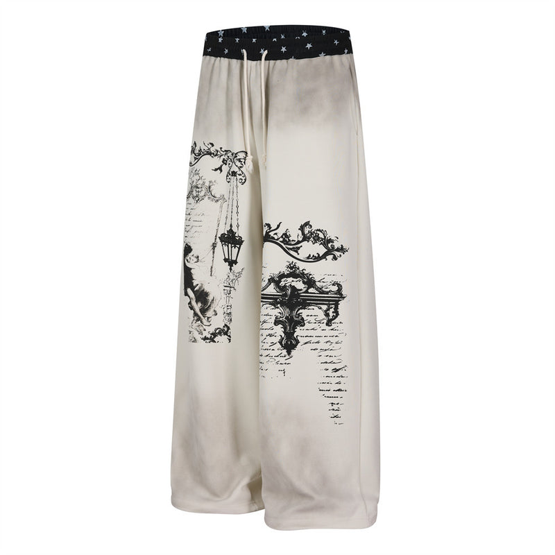 Pantalon de survêtement à jambes larges motif baroque – Imprimé usé, ceinture à étoiles