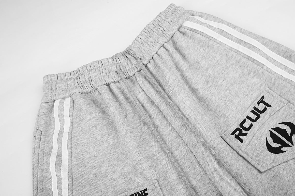 Streetwear-Jogginghose mit weitem Bein, Grafikprint & Seitenstreifen
