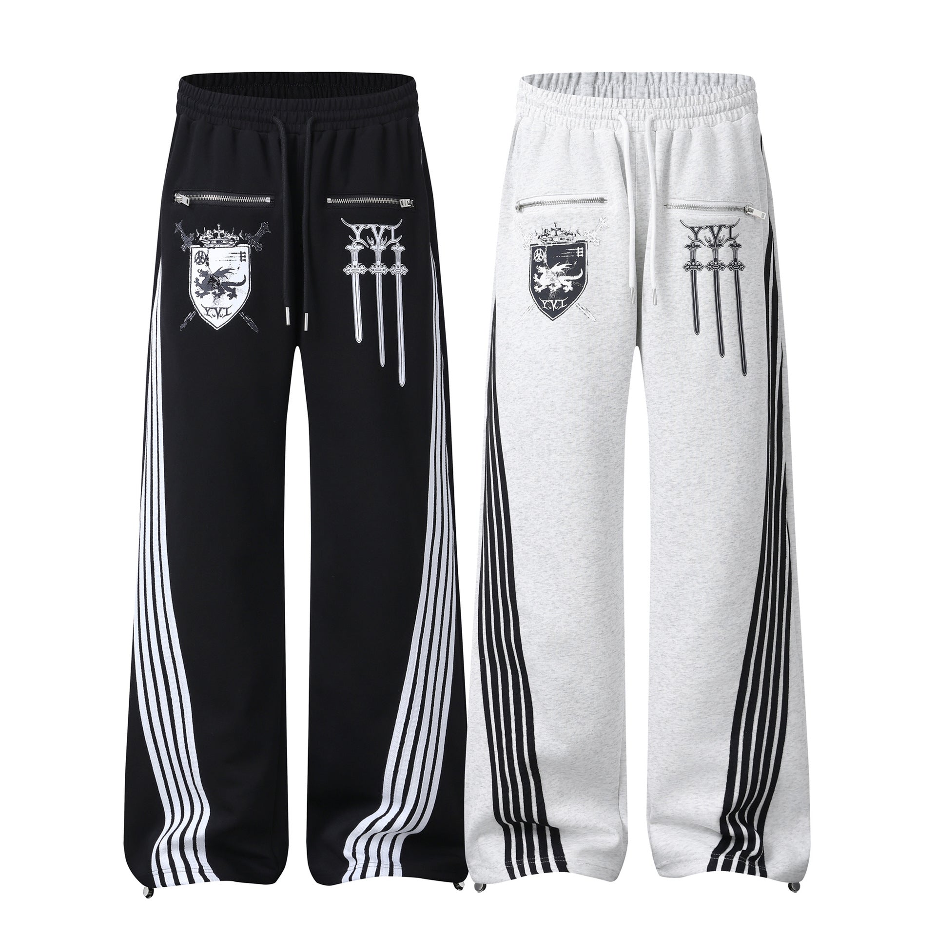 Pantalon de survêtement à jambes larges avec graphisme héraldique et détails latéraux multibandes