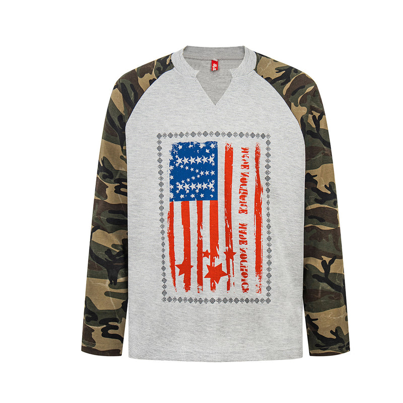Long-sleeve raglan shirt with waffle-knit grey body, woodland camo sleeves, and distressed American flag graphic on chest