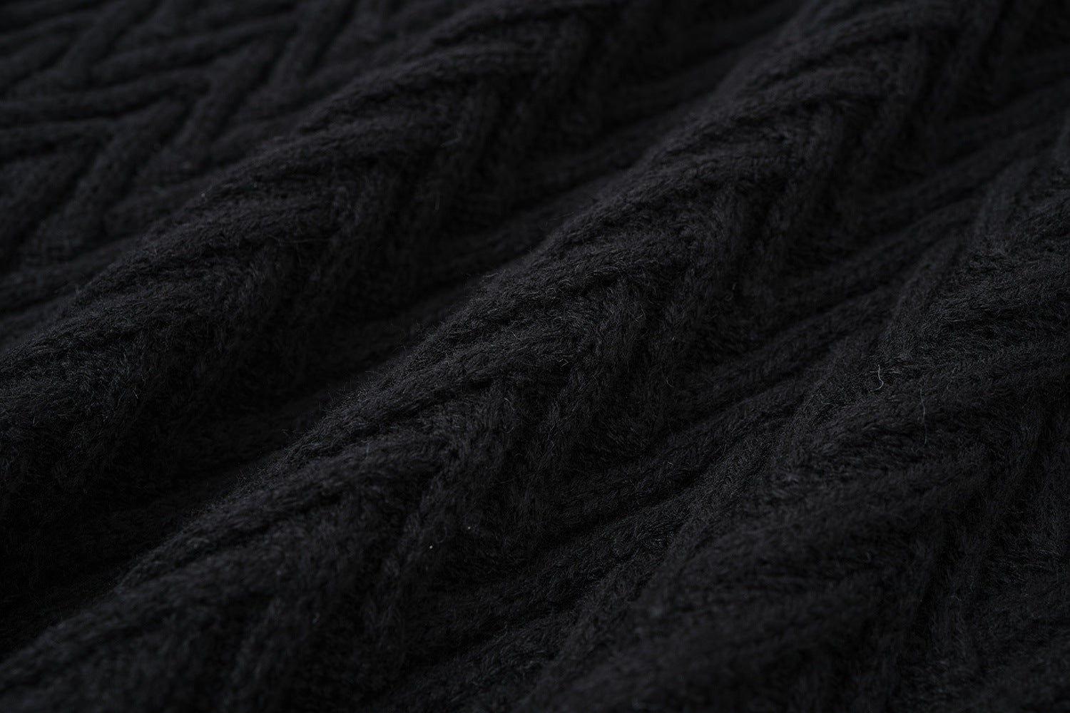 Cardigan en maille torsadée chevrons avec col châle et poches avant