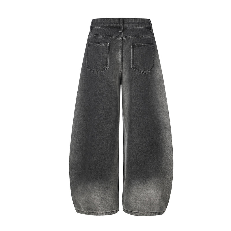Vaqueros baggy de pierna ancha con cinturilla cruzada de broches y bolsillos bordados