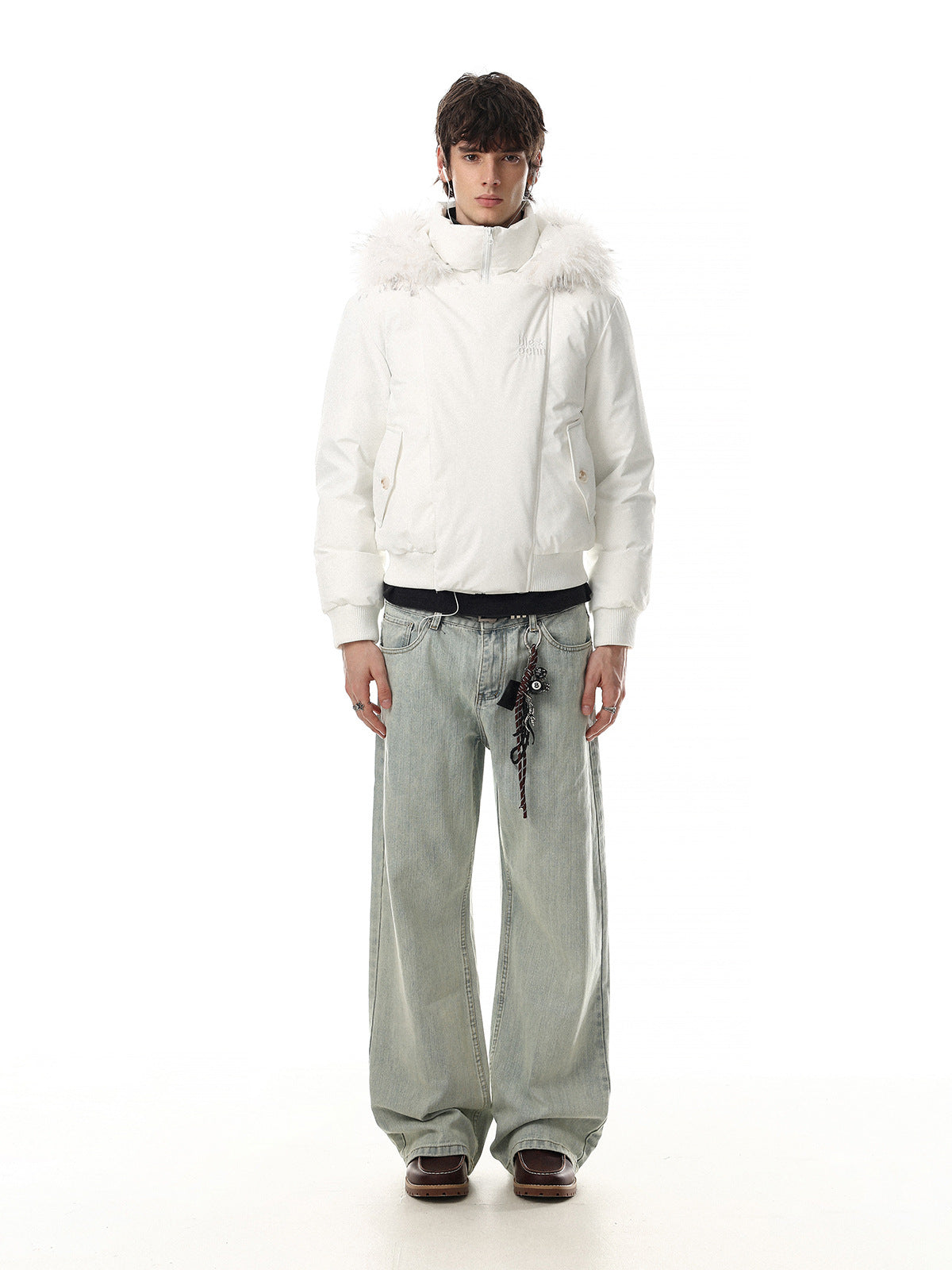White fur-collar bomber down jacket with quilted body, ribbed cuffs, and faux fur trim collar, styled with wide-leg jeans