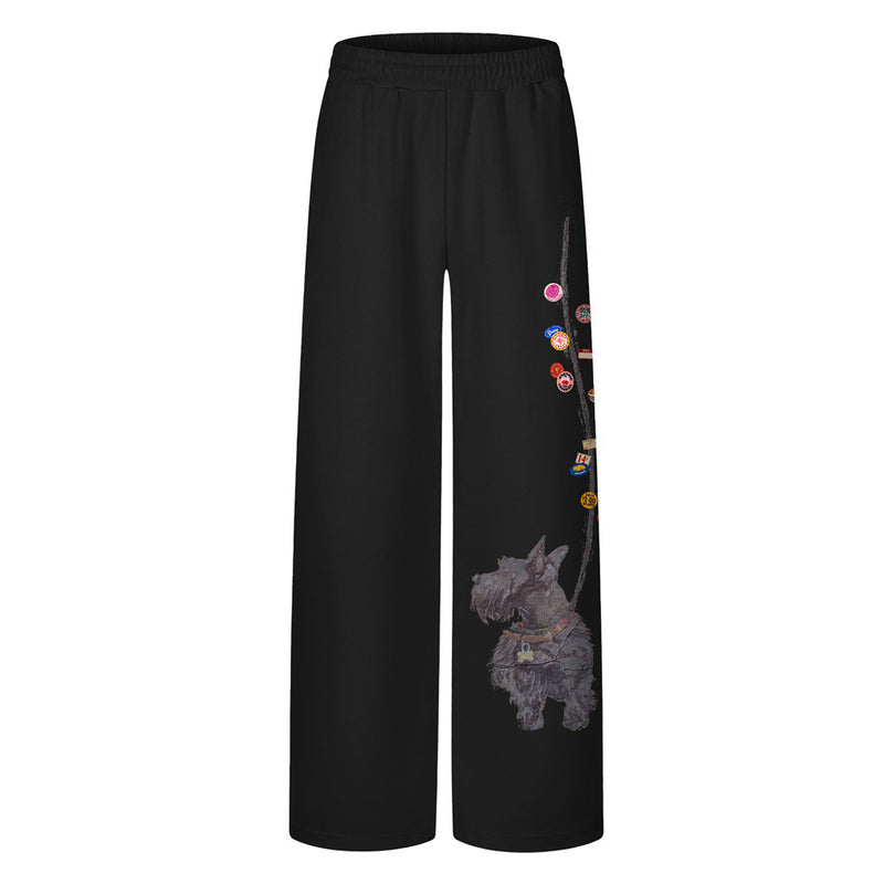 Wide-leg sweatpants with Scottie dog and vintage badge graphic print on front leg, shown in black, pink, and light grey