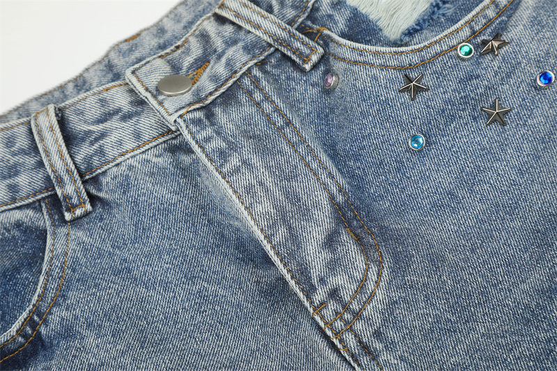 Jean large déchiré pour homme avec ornements en strass et étoiles