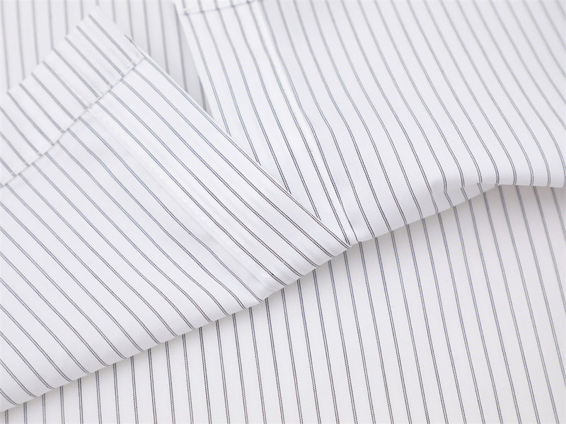 White fabric with fine vertical pinstripes and sleeve seam detail
