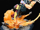 The Seakoff Premium Demon Slayer Urogi Figure (37cm) features a high-quality GK model depicting Urogi in an action scene with a sword, surrounded by fiery explosions and rock debris. The intense orange flames are enhanced by USB light-up effects, adding drama to its mid-leap/attack pose.