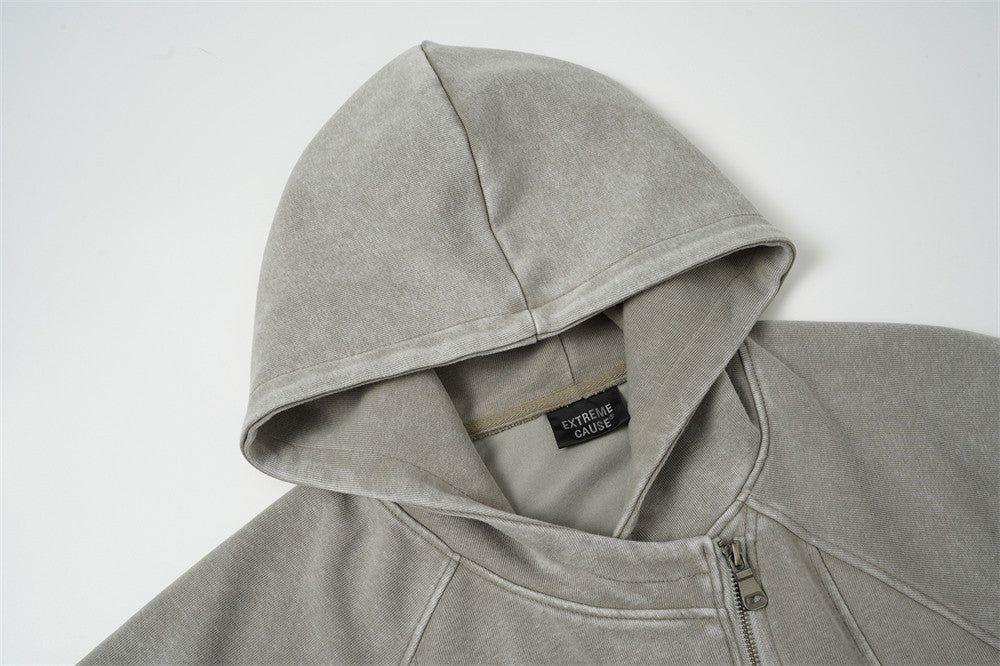 Sweat à capuche zippé homme délavé à l’acide, avec zip diagonal et empiècements déconstruits